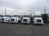2005 VOLVO TANDEM DAY CAB WHITE ISX 400 HP WITH 10 SP FULLER